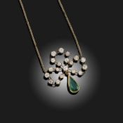 AN EMERALD AND DIAMOND-SET SHAMROCK PENDANT