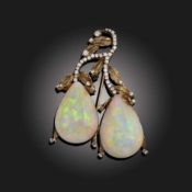 AN OPAL AND DIAMOND SCROLL BROOCH