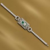 AN ART DECO EMERALD AND DIAMOND BRACELET