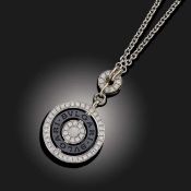 BULGARI, A DIAMOND AND ONYX 'ASTRALE' PENDANT NECKLACE