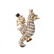 A DIAMOND, RUBY AND ONYX BROOCH