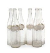 A SET OF SIX FRENCH GLASS LIQUEUR OR SPIRIT BOTTLES