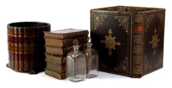 A LEATHER FAUX BOOK WASTE PAPER BASKET