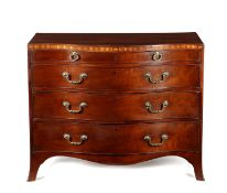 A GEORGE III MAHOGANY SERPENTINE CHEST