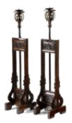 A PAIR OF CHINESE STAINED WOOD CASDLESTANDS