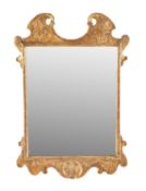 A GEORGE II GILTWOOD WALL MIRROR