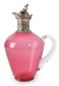 A LATE VICTORIAN RUBY GLASS CLARET JUG