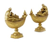 A PAIR OF CONTINENTAL GILTWOOD MODELS OF OIL LAMPS