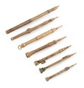 A mixed lot of seven gold and gilt-metal pencils,