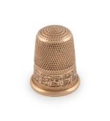 A 9-carat gold thimble,