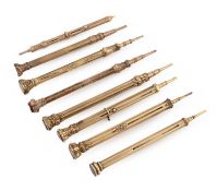 A collection of eight Victorian gold and gilt-metal pencils,