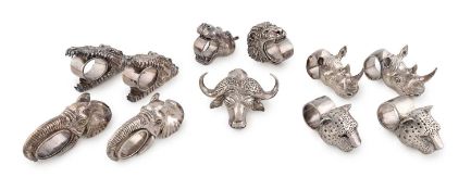 A collection of novelty animal metalware napkin rings,