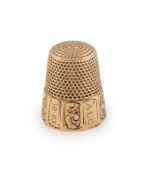 An American gold thimble,