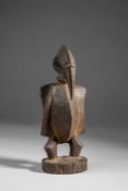 A SENUFO BIRD CRESTING