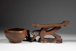 A TSONGA HEADREST WITH A BOWL