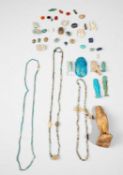 A SMALL COLLECTION OF EGYPTIAN AMULETS AND BEADS