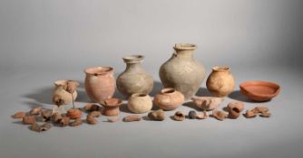 A COLLECTION OF FRAGMENTARY POTTERY HEADS