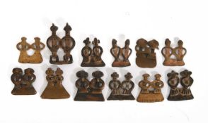 TWELVE SENUFO AMULETS