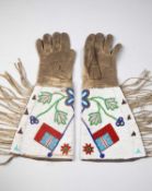 A PAIR OF CREE GAUNTLETS