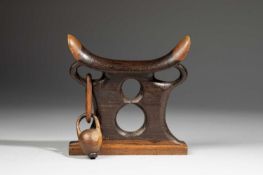 A ZULU HEADREST WITH SNUFF CONTAINER