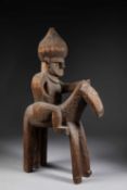 A NURISTAN GANDAU EQUESTRIAN FIGURE