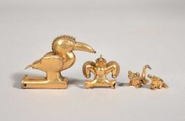 A COLOMBIAN GILT METAL STAFF FINIAL