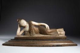 A THAI RECLINING FEMALE FIGURE