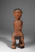 A BEMBA SEATED FIGURE