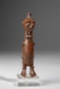 A LULUWA MINIATURE STANDING FIGURE
