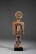 AN ADA STANDING FEMALE FIGURE