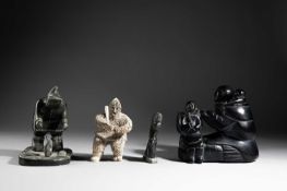 FOUR INUIT FIGURES