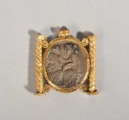 A HELLENISTIC STYLE GOLD MOUNTED PENDANT
