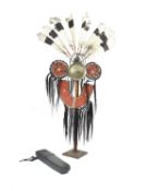 λA NAGA MAN'S HEADDRESS