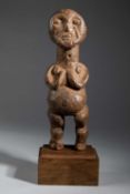 A MAMBILA STANDING FEMALE FIGURE