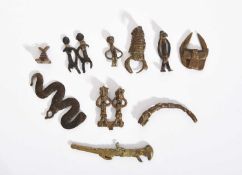 TEN WEST AFRICAN BRONZE AMULETS / WEIGHTS