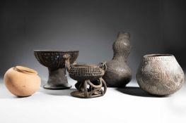 A NUPE POTTERY FOOTED BOWL