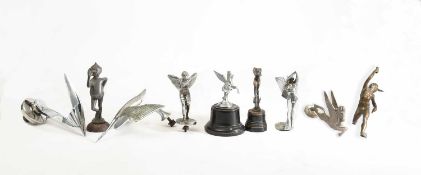 A collection of early 20th Century car mascots