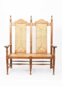 William Birch, An Arts and Crafts oak rush seat settle