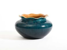 Christopher Dresser (1834-1904) for Linthorpe Pottery, A squat form vase