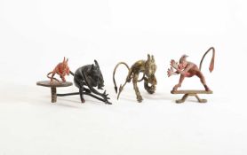 In the manner of Franz Xavier Bergmann (1861-1936), four cast metal models of the devil, circa 1920