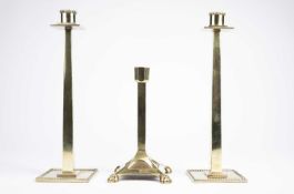 An Art Nouveau brass candlestick