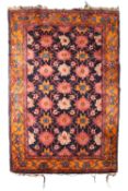 Attributed to Gavin Morton (1867-1954) for Alexander Morton & Co. An Arts and Crafts Donegal rug