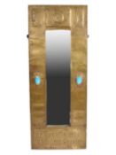 In the manner of Talwin Morris (1865-1911) A Glasgow School large copper mirror