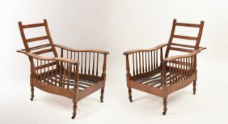 Shapland and Petter, A pair of Arts and Crafts reclining armchairs