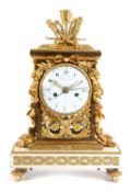 A FINE FRENCH LOUIS XVI ORMOLU AND WHITE MARBLE MANTEL CLOCK