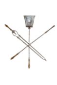 A SET OF THREE VICTORIAN POLISHED STEEL AND BRONZE HANDLED FIRE TOOLS