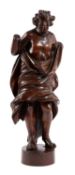 A CONTINENTAL CARVED SOFTWOOD FIGURE OF ST. JOHN THE BAPTIST