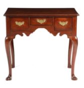 A GEORGE II VIRGINIAN WALNUT LOWBOY