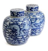A PAIR OF CHINESE BLUE AND WHITE GINGER JARS AND COVERS