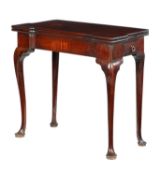 A GEORGE II MAHOGANY TEA TABLE